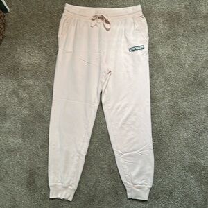 Peloton “stronger together” light pink sweatpants. Size L